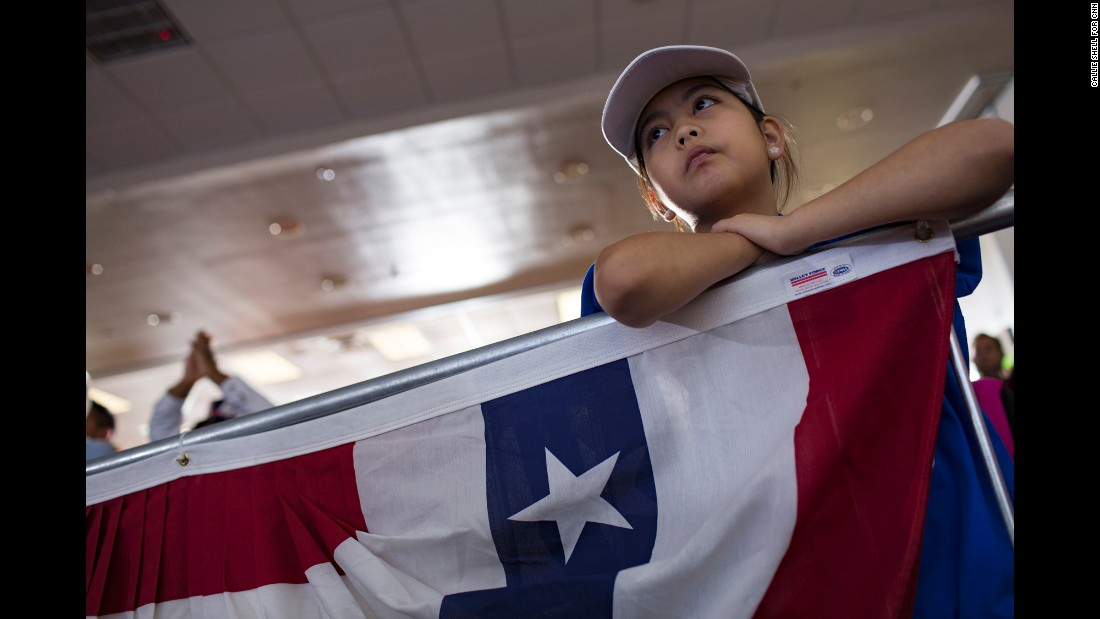 A young girl attends a Clinton rally in Las Vegas on Wednesday, November 2.