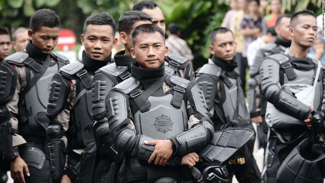Indonesian riot police were on standby in the compound of the governor&#39;s office on November 4.
