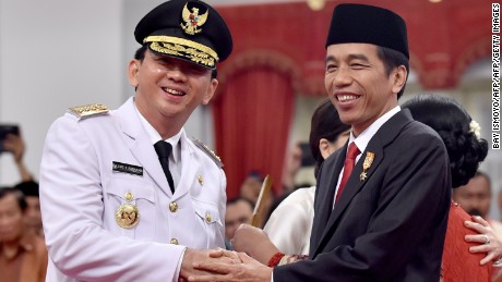 Indonesian President Joko Widodo with Ahok after the latter&#39;s swearing in as governor on November 19, 2014. 