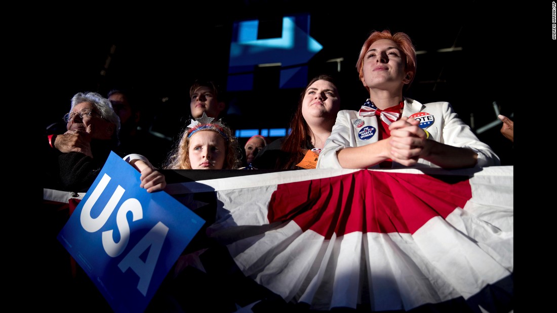 Supporters listen to Clinton in Detroit on November 4.