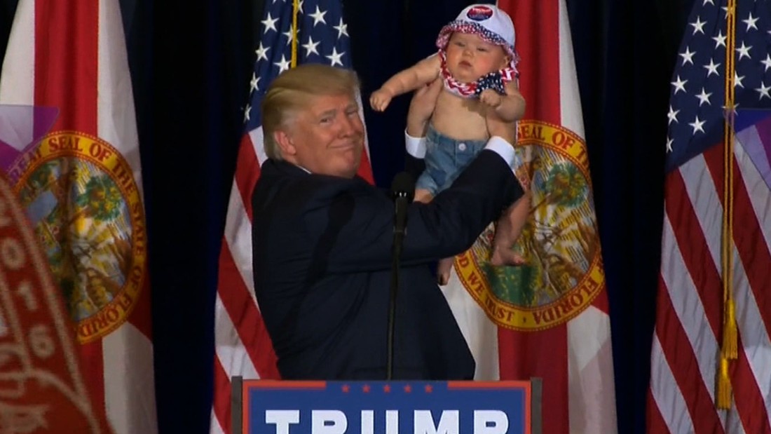 Trump brings baby on stage during rally - CNN Video