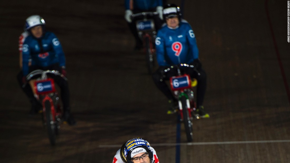 Riders, including Huybrechts (no 6), take part in a Derny race during the Six Day London event.