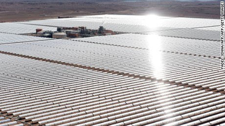 An aerial view of the solar mirrors at the Noor 1 Concentrated Solar Power (CSP) plant, some 20km (12.5 miles) outside the central Moroccan town of Ouarzazate on February 4, 2016. 
Noor 1 is one of the largest solar plants in the world, which is the first stage of a larger project designed to boost renewable energy production in Morocco. / AFP / FADEL SENNA        (Photo credit should read FADEL SENNA/AFP/Getty Images)
