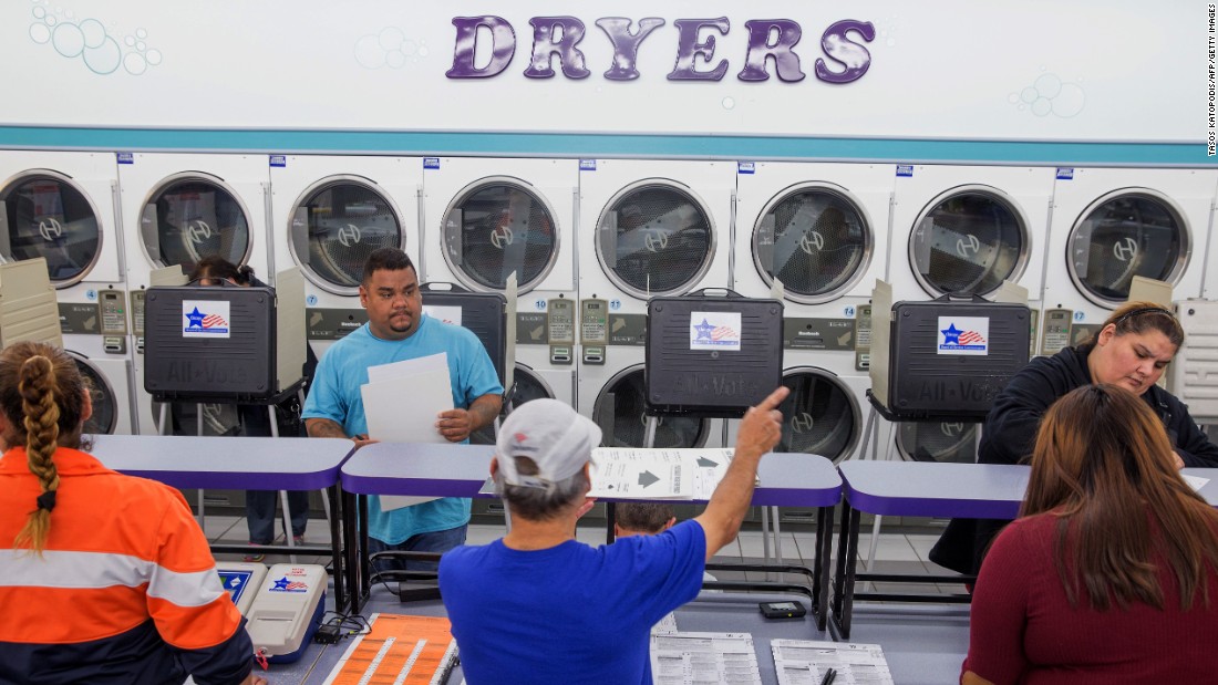 Voters cast their ballots at a Chicago laundromat on November 8.