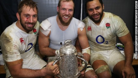 Chris Robshaw, James Haskell and Billy Vunipola of England pose with the Calcutta Cup in 2016.