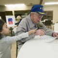WWII vet cheered while voting