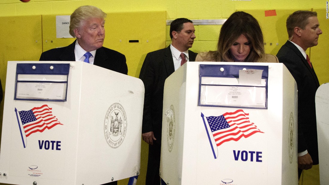 Republican presidential nominee Donald Trump looks at his wife, Melania, as they cast their votes in New York.