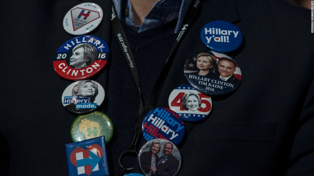 Buttons decorate a Clinton supporter at the Javits Center.