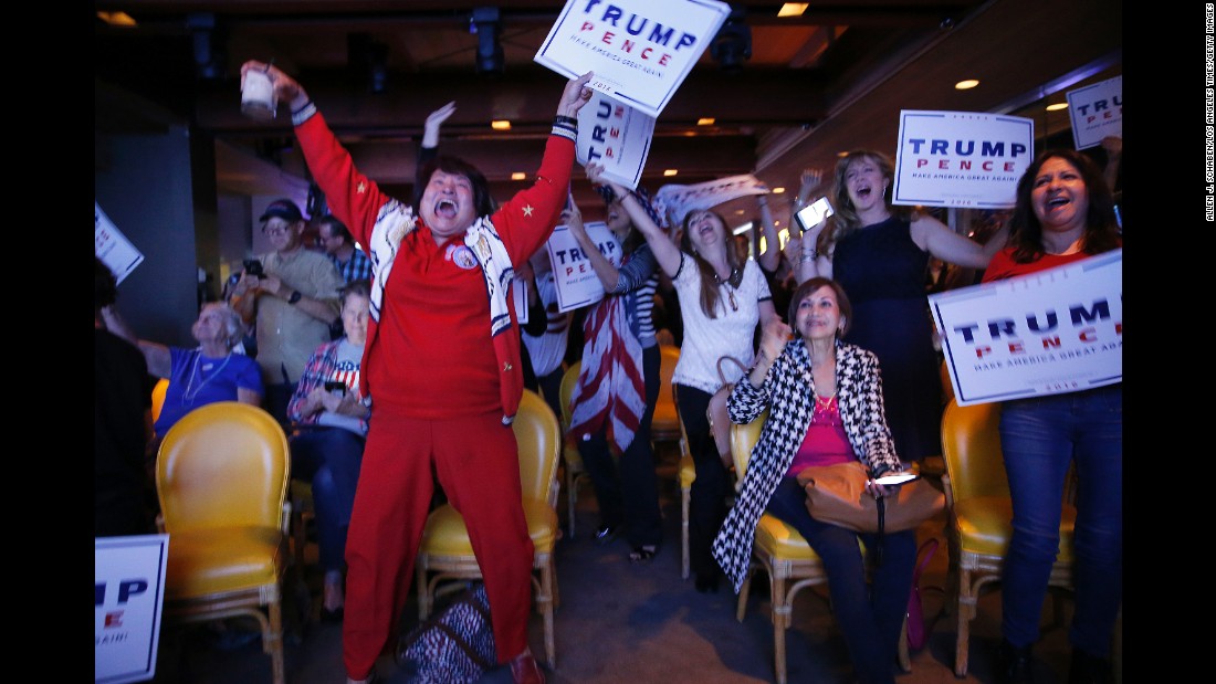 Republicans in Newport Beach, California, erupt in celebration as Trump&#39;s victory in Florida is announced.
