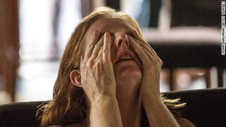 A Democratic supporter cries after Trump&#39;s victory is announced 