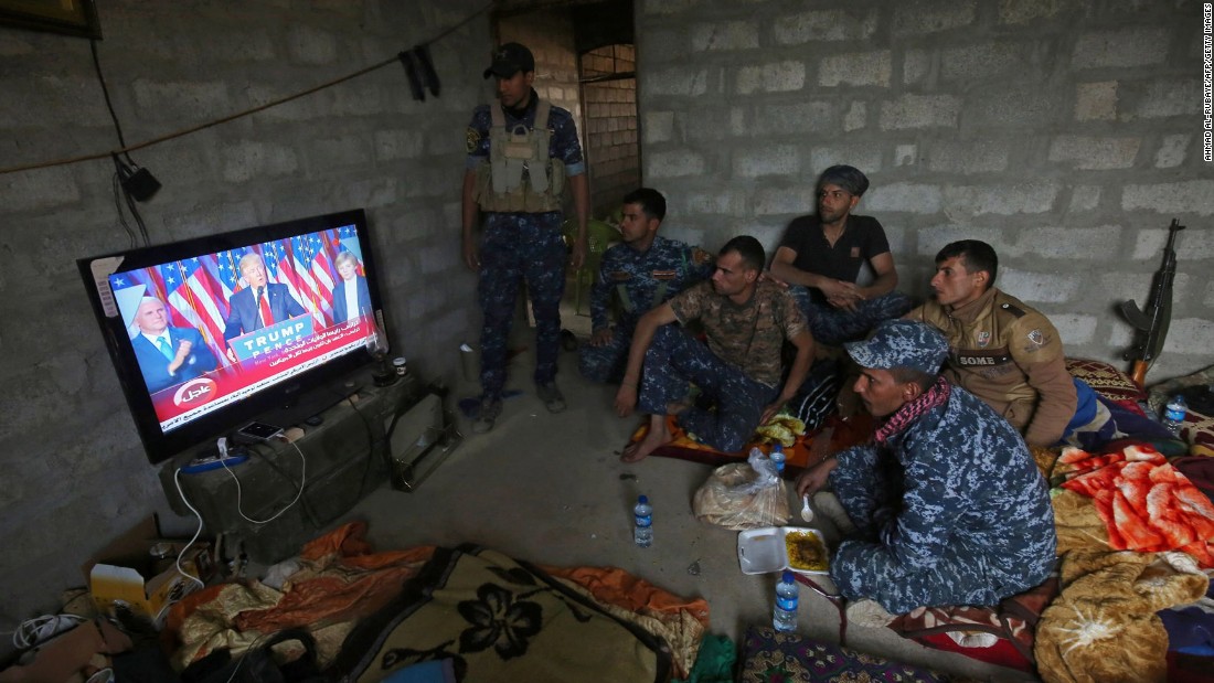 Iraqi troops watch a broadcast of Donald Trump&#39;s acceptance speech in a house in Arbid, on the outskirts of Mosul, on Wednesday, November 9. Iraqi Prime Minister Haider al-Abadi congratulated Trump on his win and said he hoped for continued support in the war on ISIS.