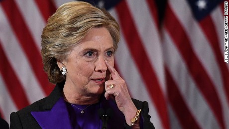 Hillary Clinton pauses as she makes a concession speech after being defeated by Republican President-elect Donald Trump, in New York on November 9, 2016.