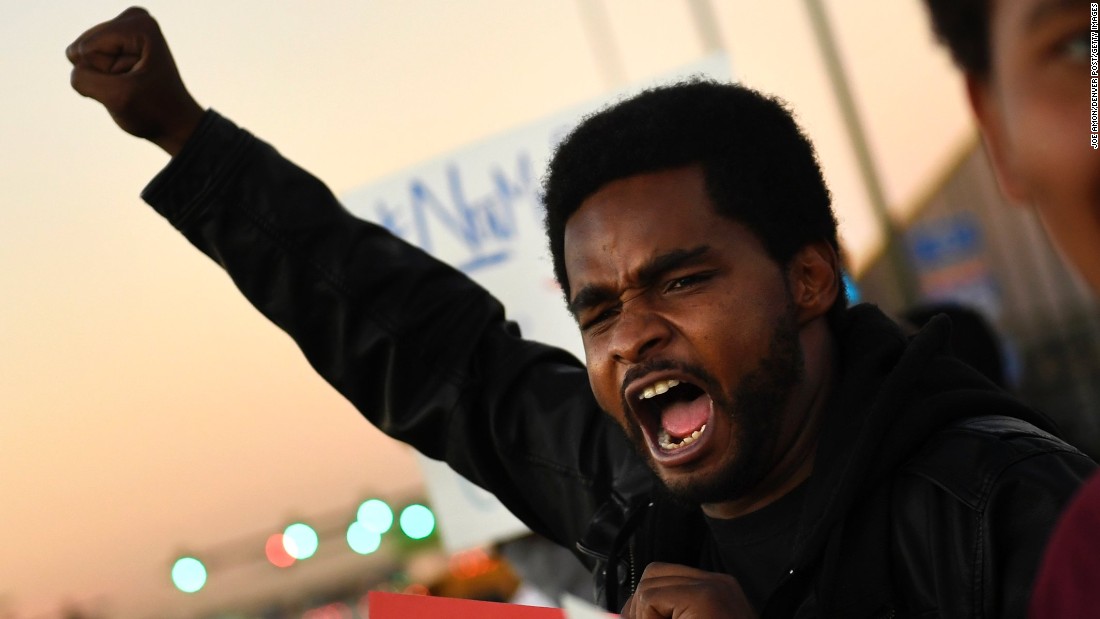 Charles Watkins speaks out at an anti-Trump protest in Denver on November 9.