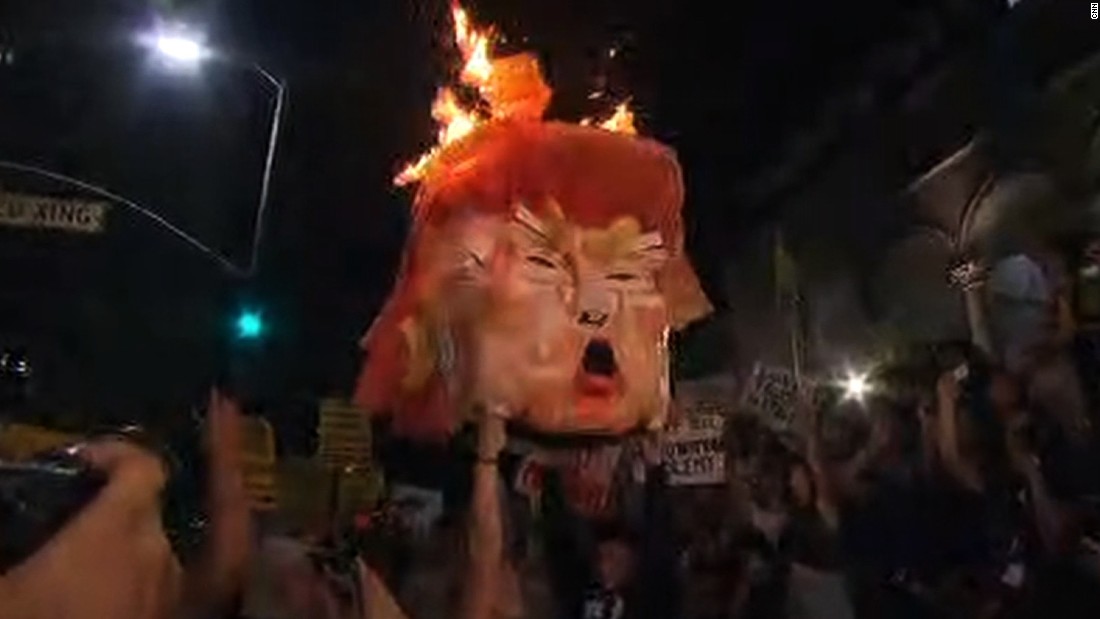 Donald Trump effigy burned by protesters - CNN Video