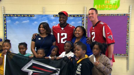 NFL QB surprises teachers &amp; students