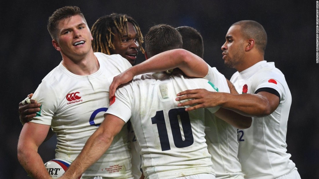 Owen Farrell (far left) celebrates scoring his team&#39;s fourth try during the first England win over South Africa in a decade.