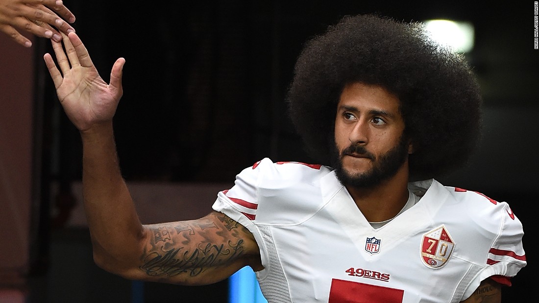 Colin Kaepernick: I won't stand 'to show pride in a flag for a country that  oppresses Black people'