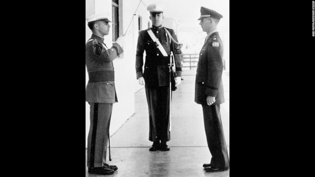 Trump, center, stands at attention during his senior year at the New York Military Academy in 1964.