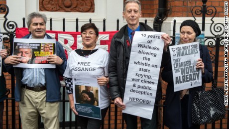 Supporters of Julian Assange gather outside Ecuador&#39;s Embassy in London Monday.