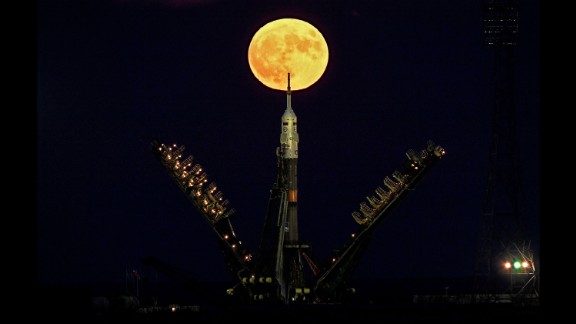 The supermoon is seen behind the Soyuz spacecraft at the Baikonur cosmodrome in Kazakhstan on November 14.