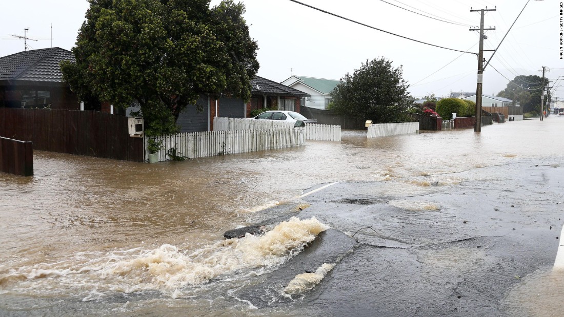 A cracked street is flooded in the area of Petone, near Wellington, after severe weather impacted the region in the aftermath of the quake on November 15. Two people were killed in the quake, which was followed by more than 1,000 aftershocks.