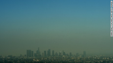 A view of the Los Angeles city skyline as heavy smog shrouds the city in California on May 31, 2015.           AFP PHOTO/ MARK RALSTON        (Photo credit should read MARK RALSTON/AFP/Getty Images)