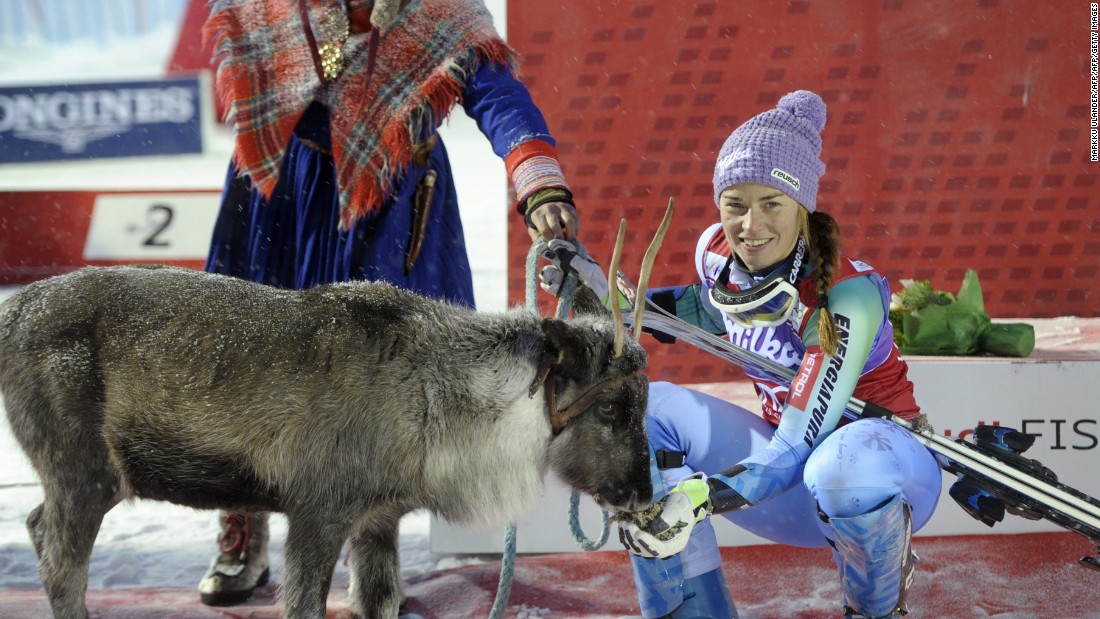Slovenia&#39;s Tina Maze meets her reindeer, Viktor, after winning in 2014. Maze retired from professional skiing earlier this season. 