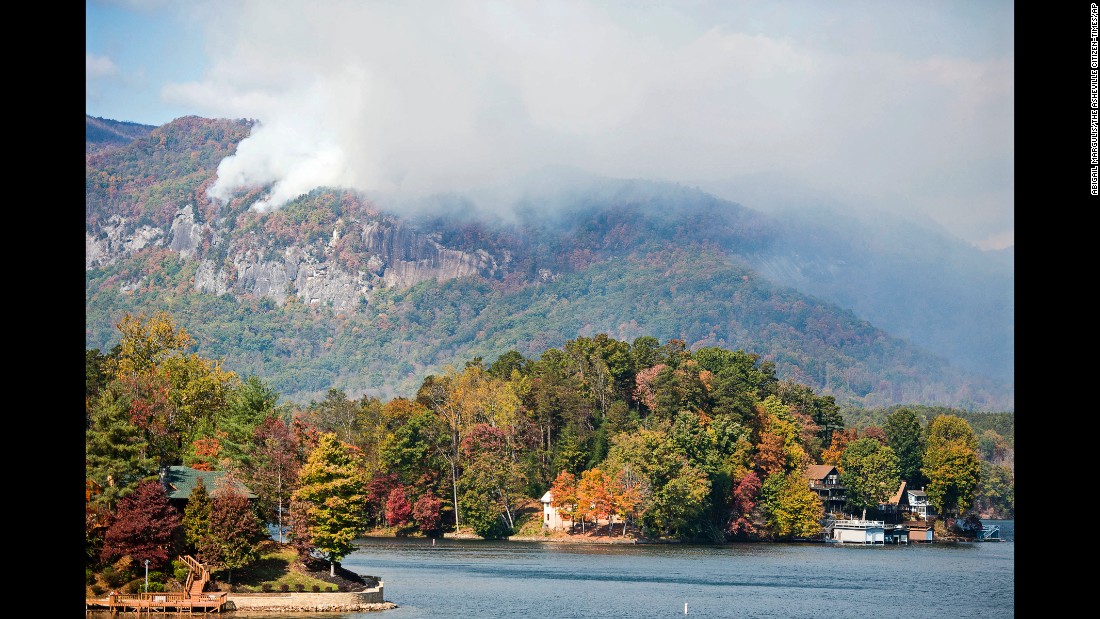 Smoke from the Party Rock fire spreads near Lake Lure on Wednesday, November 9.