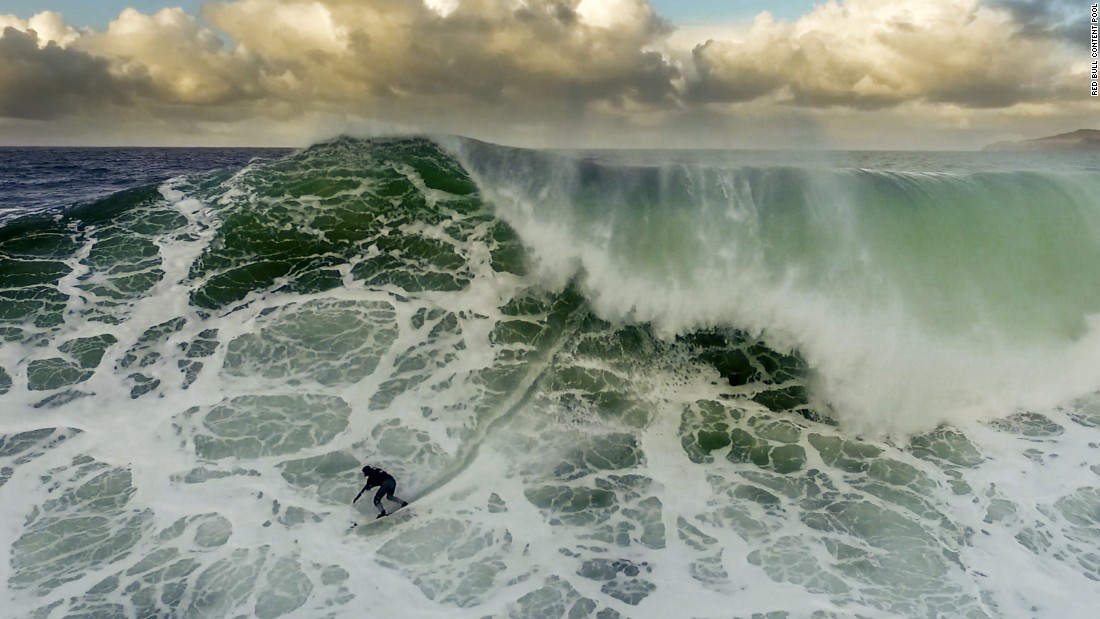 British surfer Andrew Cotton hopes to ride the biggest wave in history, ideally in previously untouched waters. 