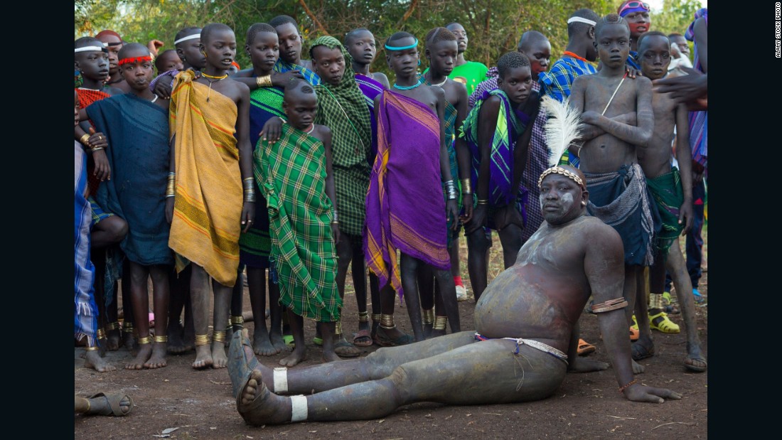 Every June or July in the Omo Valley, Ethiopia, the &lt;em&gt;Ka&#39;el&lt;/em&gt; -- the Bodi lunar new year -- takes place. With it comes an extraordinary show of pageantry. In the months before the event men live in isolation and drink to excess &lt;a href=&quot;/2015/10/02/africa/milk-big-business-africa/index.html&quot; target=&quot;_blank&quot;&gt;a mixture of cow milk and cow blood&lt;/a&gt; for months in order to become vastly bloated and overweight. Each clan will then present an unmarried male to compete for the title of fattest man -- and with the glory, the greater chance of finding a wife. With stomachs swollen, balance and fatigue can be an issue, but once the event is over, contestants return to their normal size in a matter of weeks. 