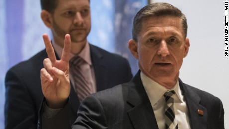 NEW YORK, NY - NOVEMBER 17: Retired Lt. Gen. Michael Flynn gestures as he arrives at Trump Tower, November 17, 2016 in New York City. President-elect Donald Trump and his transition team are in the process of filling cabinet and high level positions for the new administration. (Photo by Drew Angerer/Getty Images)