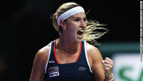 SINGAPORE - OCTOBER 23:  Dominika Cibulkova of Slovakia celebrates a point in her singles match against Angelique Kerber of Germany during day 1 of the BNP Paribas WTA Finals Singapore at Singapore Sports Hub on October 23, 2016 in Singapore.  (Photo by Julian Finney/Getty Images)