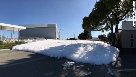 A malfunction at the Signature Flight Support hangar caused fire retarding foam to spill on to the near by streets.