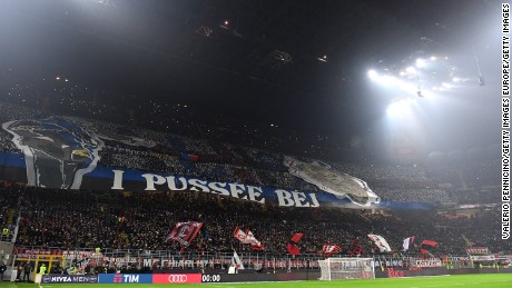 Inter fans respond with impressive mosaic of their own at the opposite end of the San Siro.