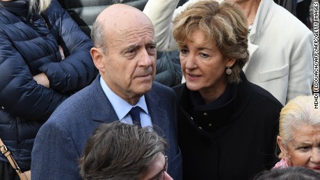 Alain Juppe with his wife Isabelle Juppe at a polling station in Bordeaux on November 20, 2016.