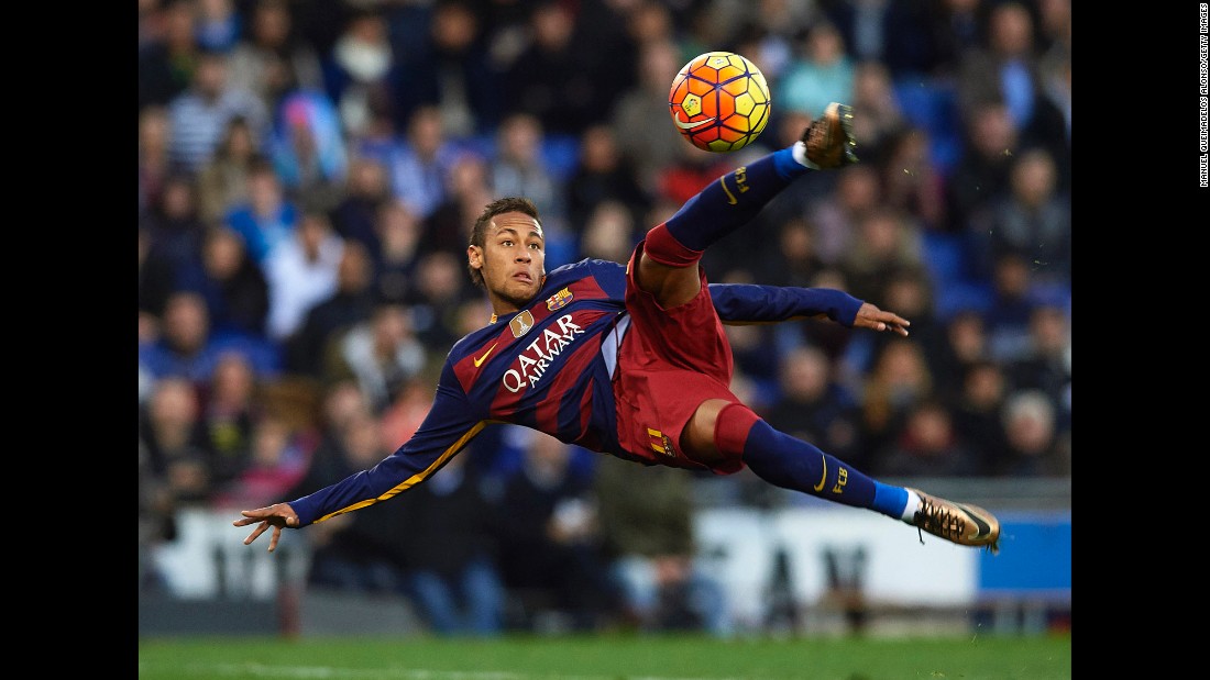 Neymar, a forward for FC Barcelona, concentrates on the ball during a Spanish league match against city rivals Espanyol on Saturday, January 2.