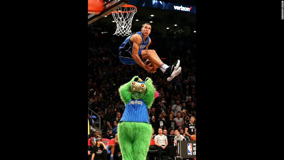 Orlando&#39;s Aaron Gordon leaps over the team&#39;s mascot, Stuff the Magic Dragon, during the &lt;a href=&quot;http://www.cnn.com/2016/02/08/sport/gallery/nba-all-star-slam-dunk-champs/index.html&quot; target=&quot;_blank&quot;&gt;NBA Slam Dunk Contest&lt;/a&gt; on Saturday, February 13. Gordon scored a perfect 50 on the dunk, one of three 50s he had in the final round. But Zach LaVine had four and went on to win.