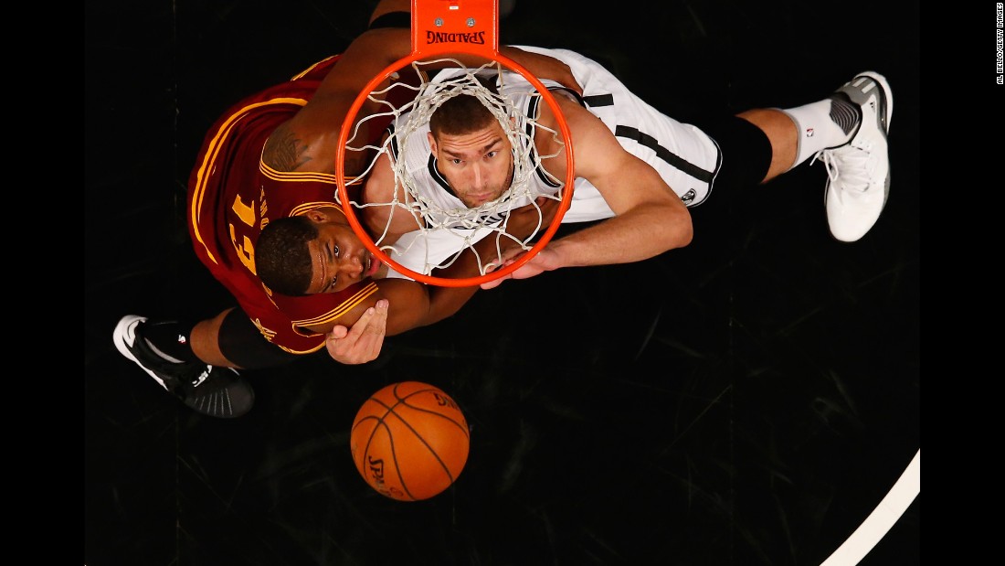 Brooklyn center Brook Lopez, right, battles Cleveland&#39;s Tristan Thompson for a rebound during an NBA game in New York on Wednesday, January 20.