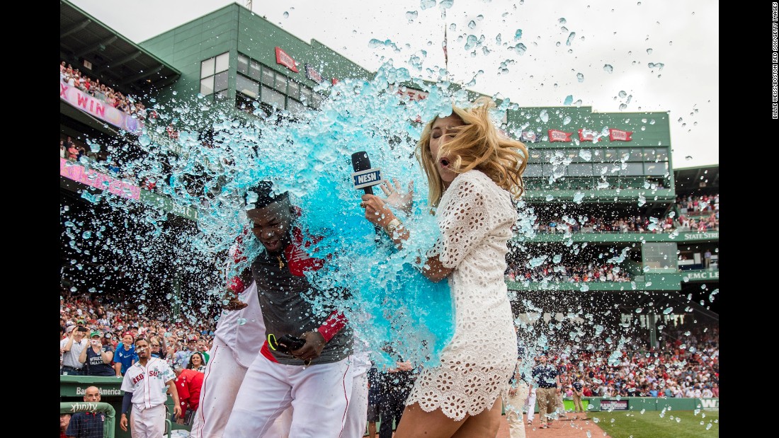 TV reporter Guerin Austin is an unlucky bystander as David Ortiz is doused by his Boston teammates on Saturday, May 14. Ortiz had just won a game with a base hit. Austin &lt;a href=&quot;https://twitter.com/guerinaustin/status/731925964687572992&quot; target=&quot;_blank&quot;&gt;was good-natured about the incident on Twitter&lt;/a&gt; and wore a light-blue raincoat the next day.
