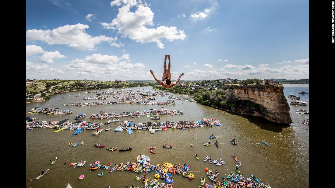 Jonathan Paredes dives into Texas&#39; Possum Kingdom Lake on Saturday, June 4. Paredes finished first in what was the opening event of the Red Bull Cliff Diving World Series.