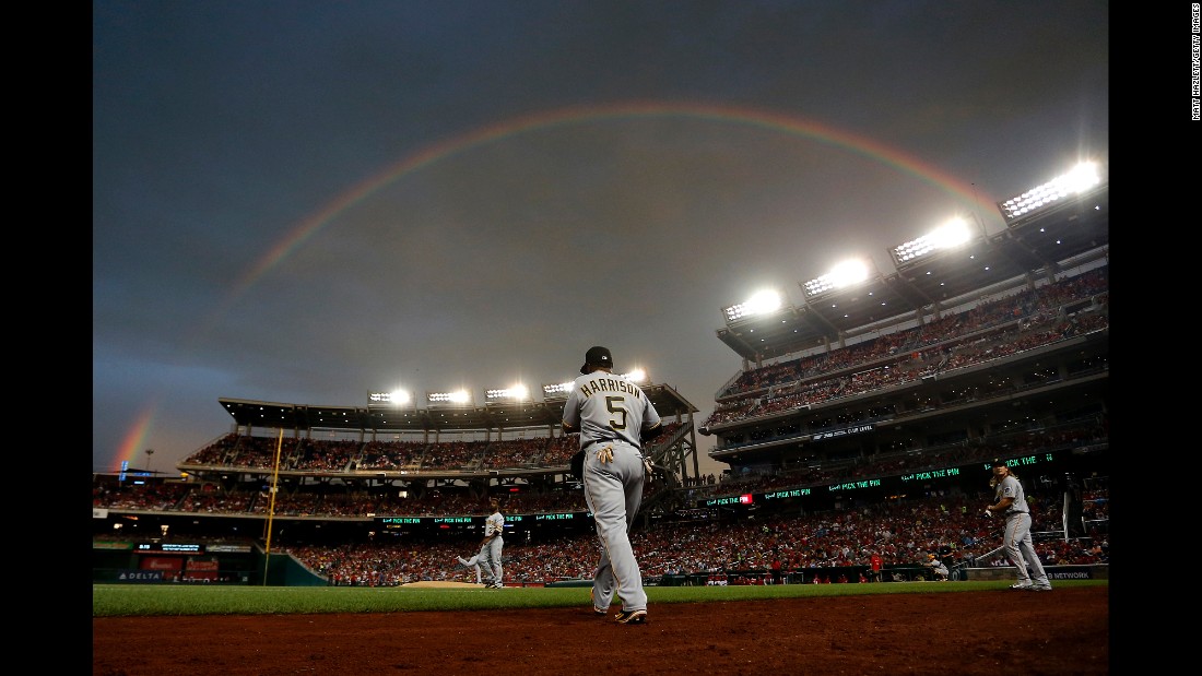 A rainbow appears over Nationals Park during a Major League Baseball game in Washington on Saturday, July 16.
