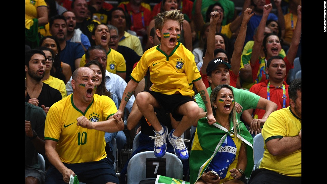 Brazil fans cheer on their women&#39;s volleyball team during an Olympic quarterfinal match against China on Wednesday, August 17.