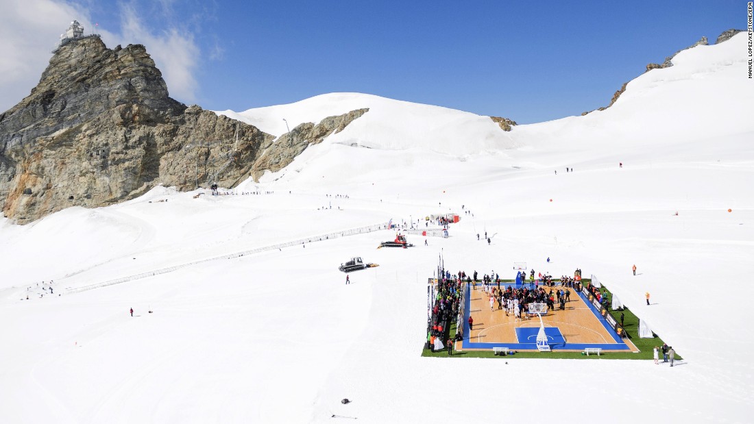 Professional basketball players, including NBA star Tony Parker, play on the Aletsch Glacier in the Swiss Alps on Wednesday, September 14. It was a promotional event for Tissot, one of Parker&#39;s sponsors.