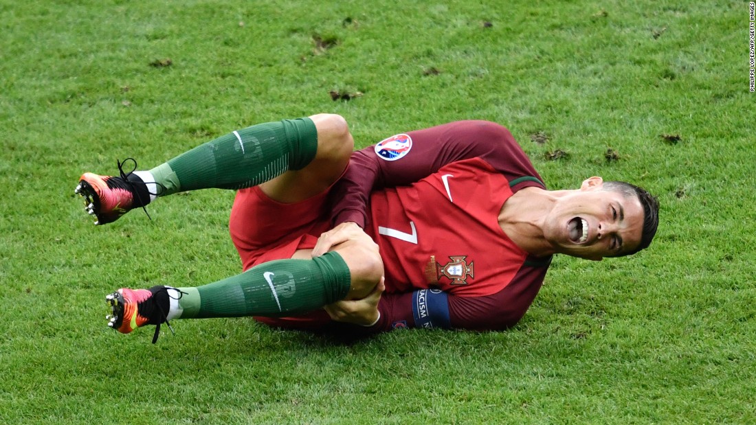 Cristiano Ronaldo reacts after a tackle by Dimitri Payet during &lt;a href=&quot;http://www.cnn.com/2016/07/10/football/france-portugal-euro-2016-final/index.html&quot; target=&quot;_blank&quot;&gt;the Euro 2016 final&lt;/a&gt; between Portugal and France on Sunday, July 10. Portugal won despite Ronaldo being forced to leave the game with a knee injury.