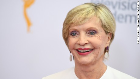 Actress Florence Henderson arrives on the red carpet for the 68th Los Angeles Emmy Awards featuring Niecy Nash, Jason George, Mary Holland, Florence Henderson and Larry King in North Hollywood, California, on July 23, 2016. 
  / AFP / Angela WEISS        (Photo credit should read ANGELA WEISS/AFP/Getty Images)