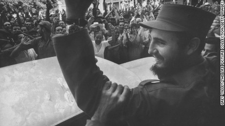 Crowds cheer Castro on his victorious march to Havana after ousting dictator Fulgencio Batista.