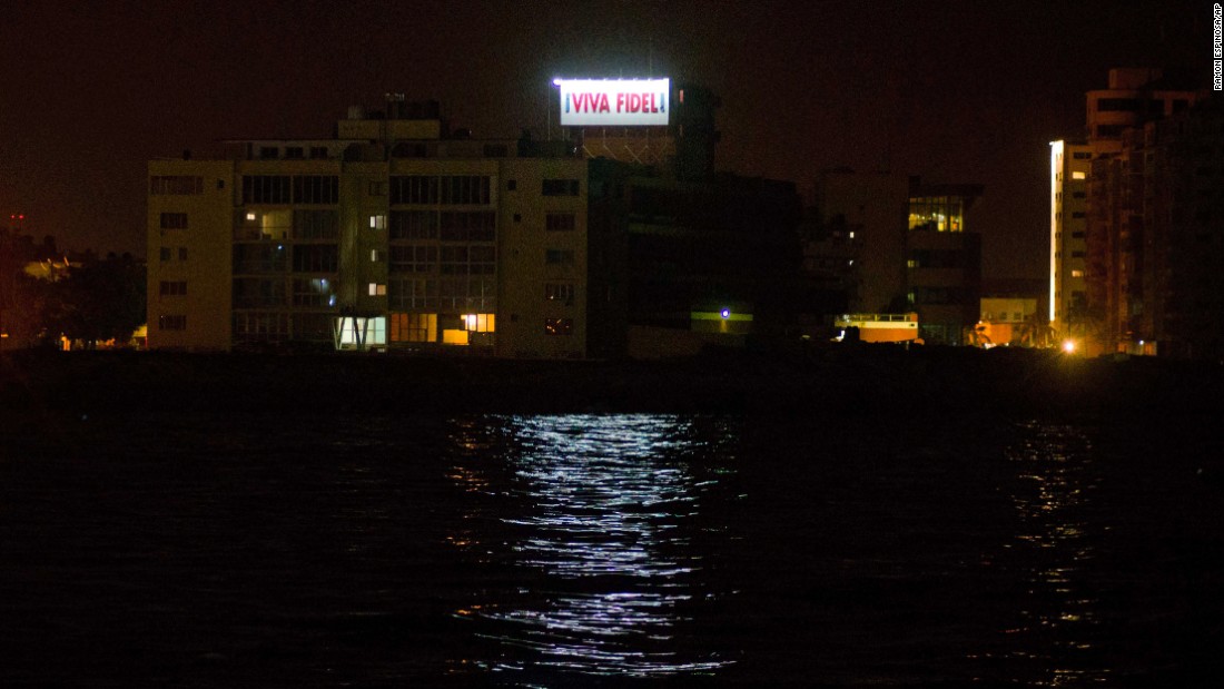 A sign that reads, &quot;Long live Fidel,&quot; stands on a government building in Havana early November 26. 
