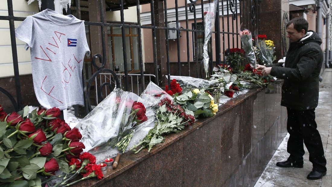 A man places flowers at the Cuban Embassy in Moscow in memory of Castro on November 26. Russian President Vladimir Putin called the Cuban leader &quot;a sincere and reliable friend of Russia.&quot; 