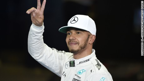Lewis Hamilton is all smiles after taking pole position for the Abu Dhabi GP at Yas Marina.