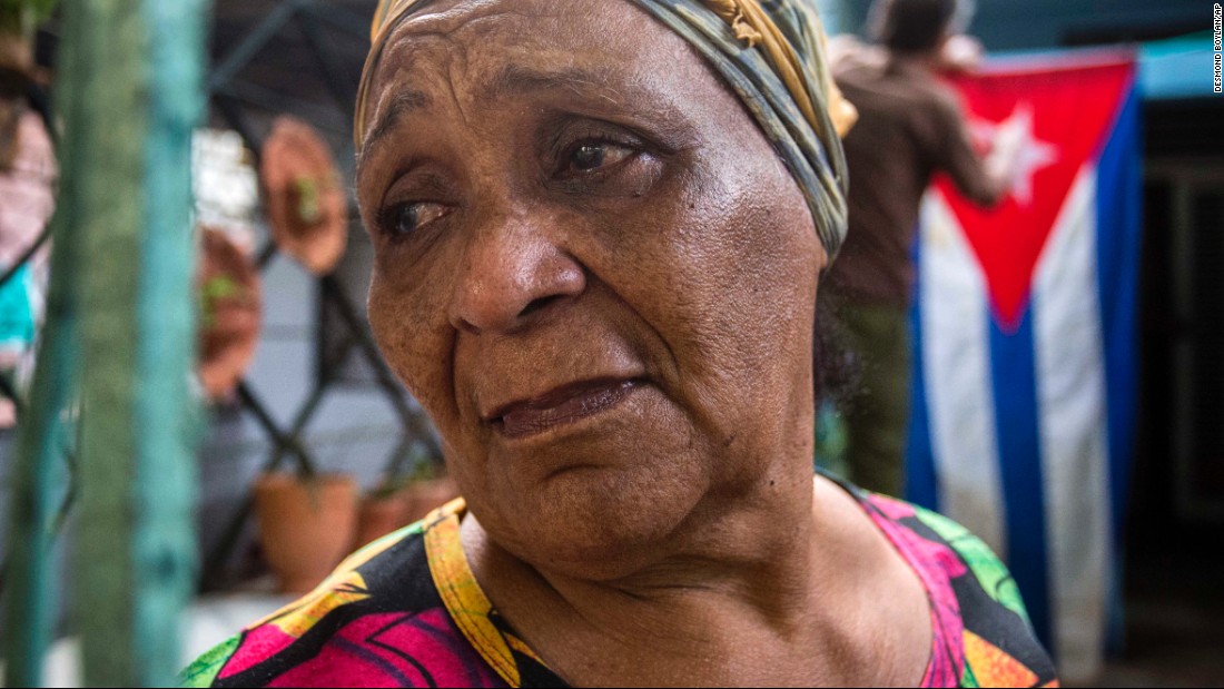 Rafaela Vargas mourns the death of former President Fidel Castro at the entrance of her home in the Vedado neighborhood in Havana, Cuba, on Saturday, November 26. 